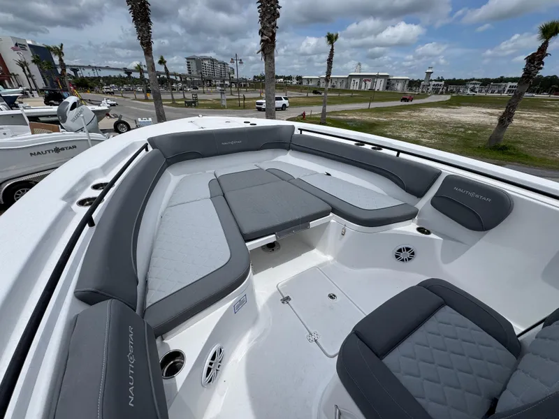 Slide: The Image of 2025 NauticStar 292 Legacy boat with spacious seating and modern design. - 11