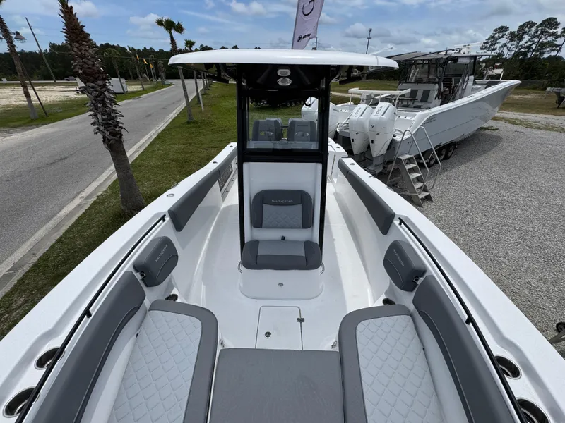 Slide: The Image of 2025 NauticStar 292 Legacy boat with sleek seating and modern design. - 13