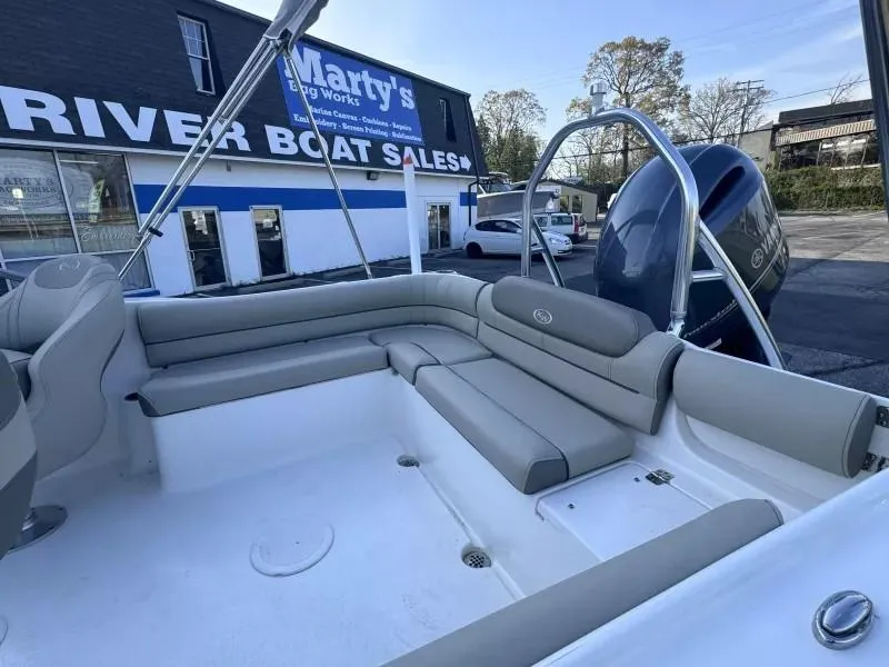 Slide: The Image of 2023 Key West 203 DFS boat interior at dealership, featuring spacious seating and modern design. - 13
