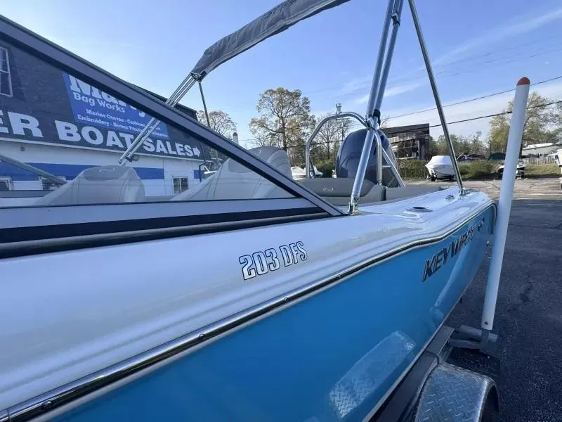 Slide: The Image of 2023 Key West 203 DFS boat displayed at a sales lot. - 6