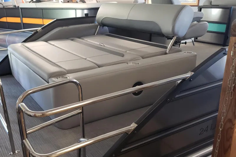 Slide: The Image of 2025 Bentley Pontoons Legacy Swingback with luxurious seating and sleek design. - 4