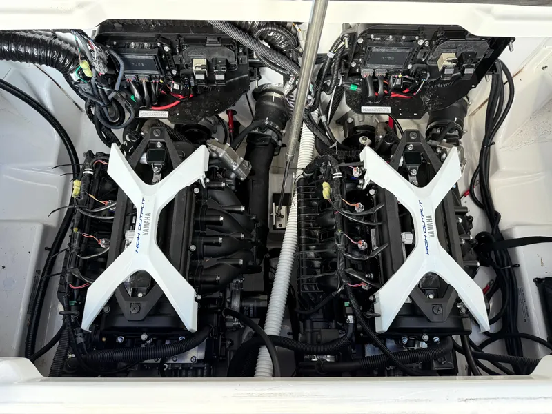 Slide: The Image of 2025 Yamaha Boats AR250 engine compartment showcasing dual engines and advanced mechanics. - 11