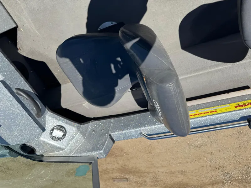 Slide: The Image of Interior view of a 2016 Tuffy Osprey 2100 boat, showing steering wheel and dashboard. - 6