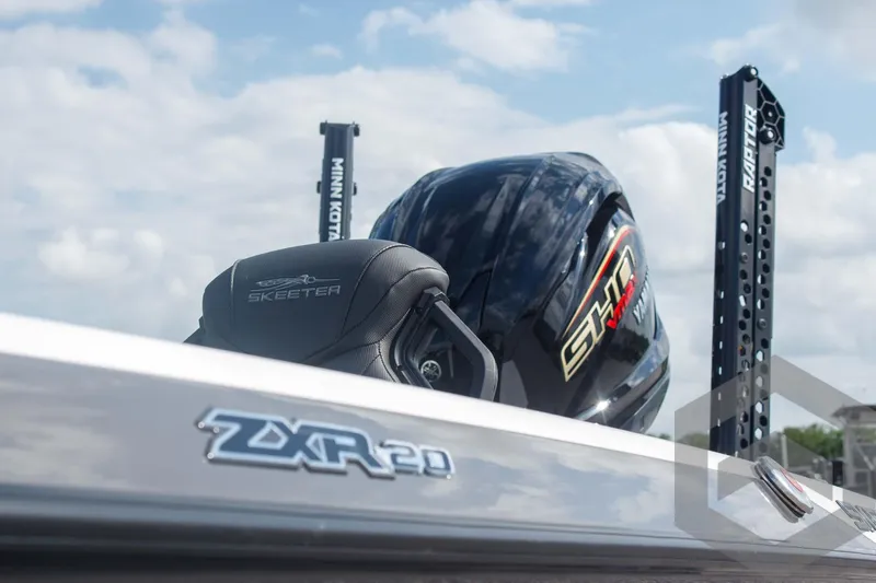 Slide: The Image of 2025 Skeeter ZXR 20 boat with powerful engine, sleek design, and modern features. - 10