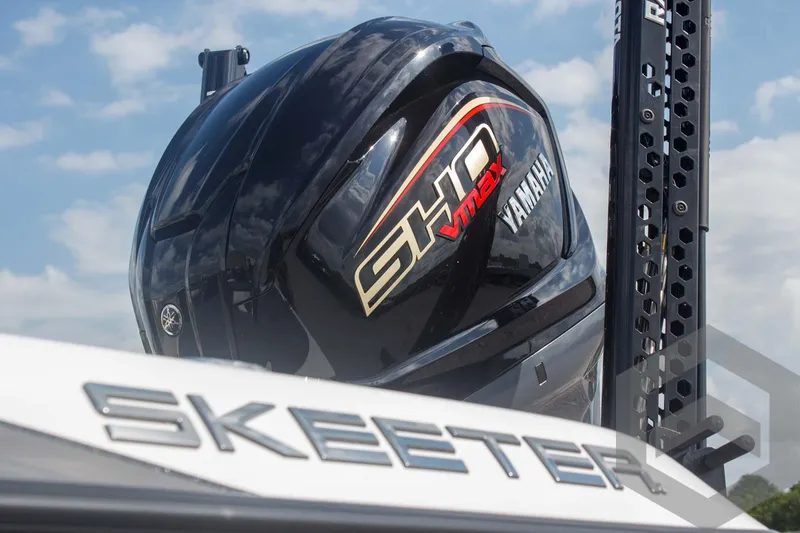 Slide: The Image of Skeeter ZXR 20 boat with Yamaha SHO VMAX engine, 2025 model, under a clear sky. - 11