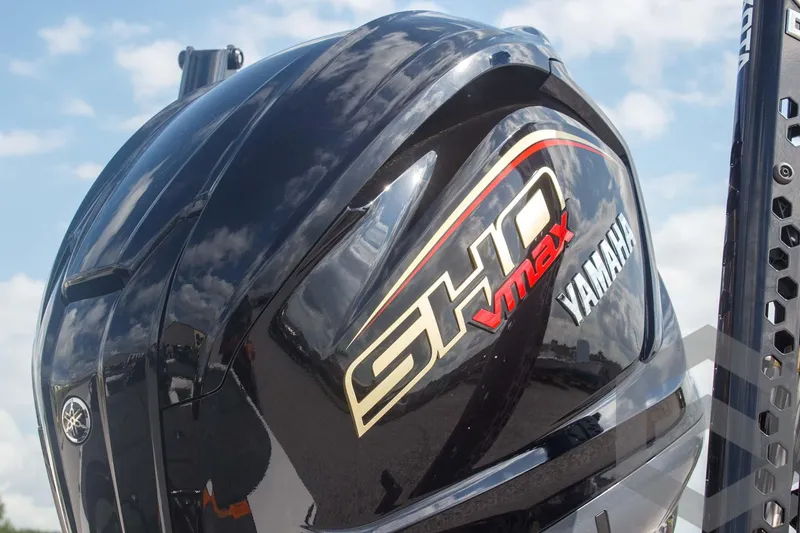 Slide: The Image of 2025 Skeeter ZXR 20 with Yamaha SHO VMAX engine, under a clear blue sky. - 12