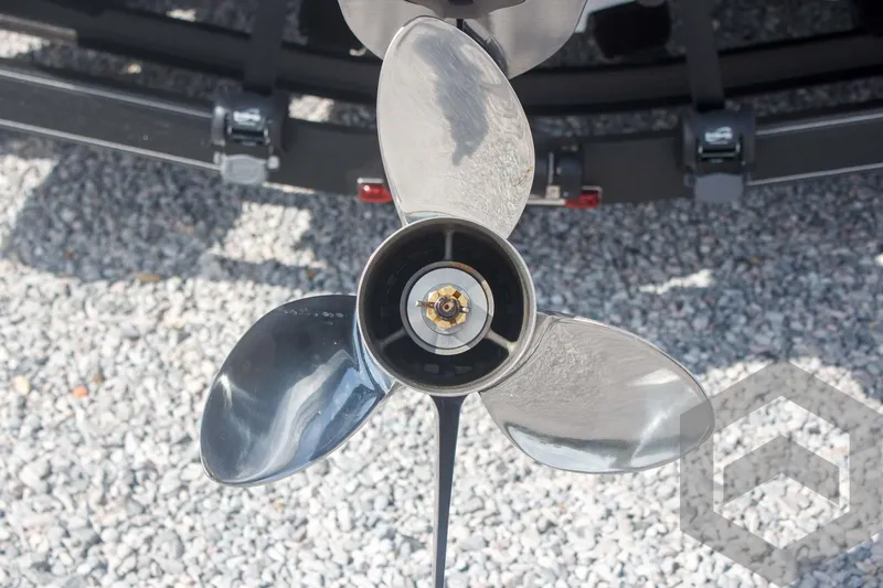 Slide: The Image of Propeller of 2025 Skeeter ZXR 20 boat on gravel surface. - 14