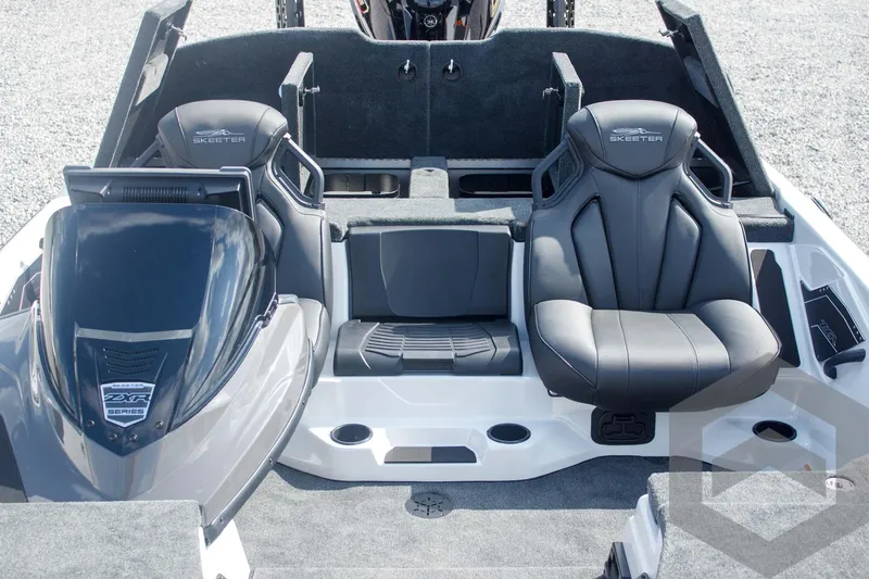 Slide: The Image of 2025 Skeeter ZXR 20 boat interior with sleek black seating and modern design. - 28