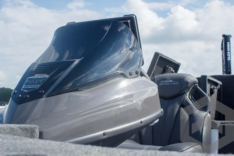 Slide: The Image of 2025 Skeeter ZXR 20 boat cockpit with sleek design and comfortable seating. - 31