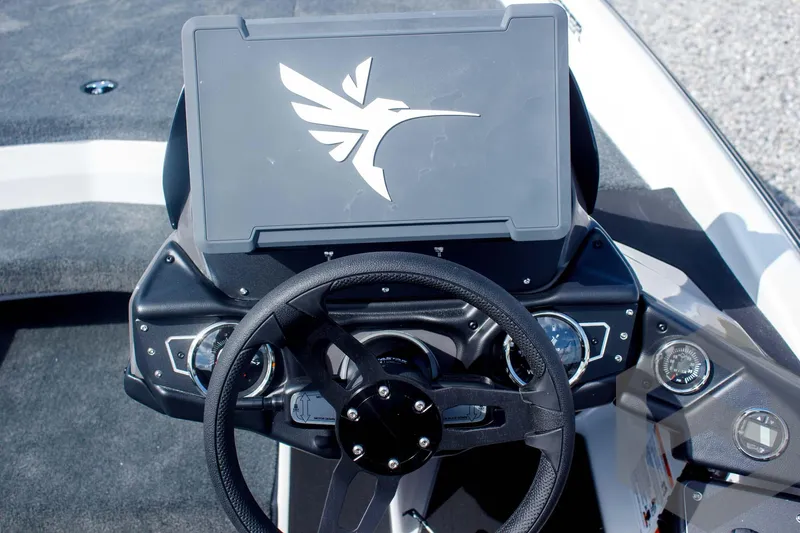 Slide: The Image of Steering console of 2025 Skeeter ZXR 20 boat with modern dashboard design. - 32