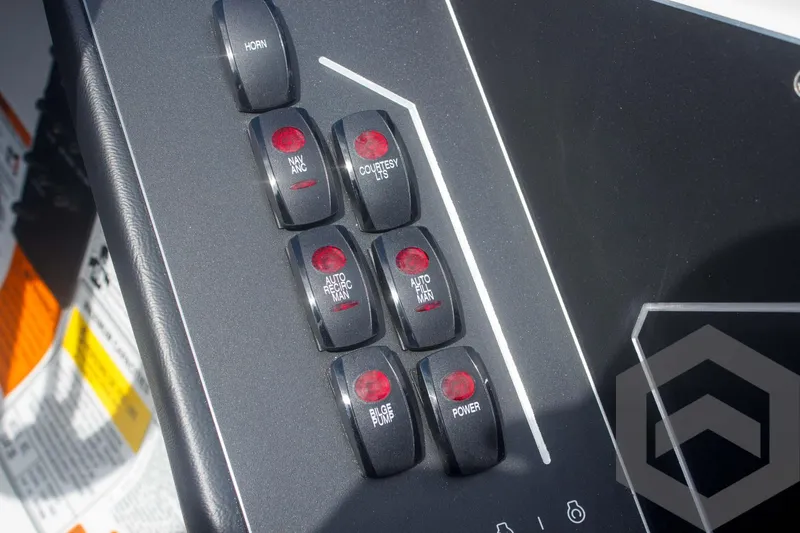 Slide: The Image of Control panel of 2025 Skeeter ZXR 20 boat with labeled switches. - 36