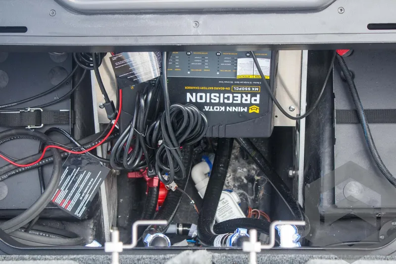 Slide: The Image of Interior view of a 2025 Skeeter ZXR 20 boat showing wiring and equipment. - 44