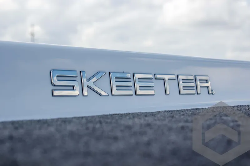Slide: The Image of 2025 Skeeter ZXR 20 boat logo on sleek surface, showcasing modern design. - 46