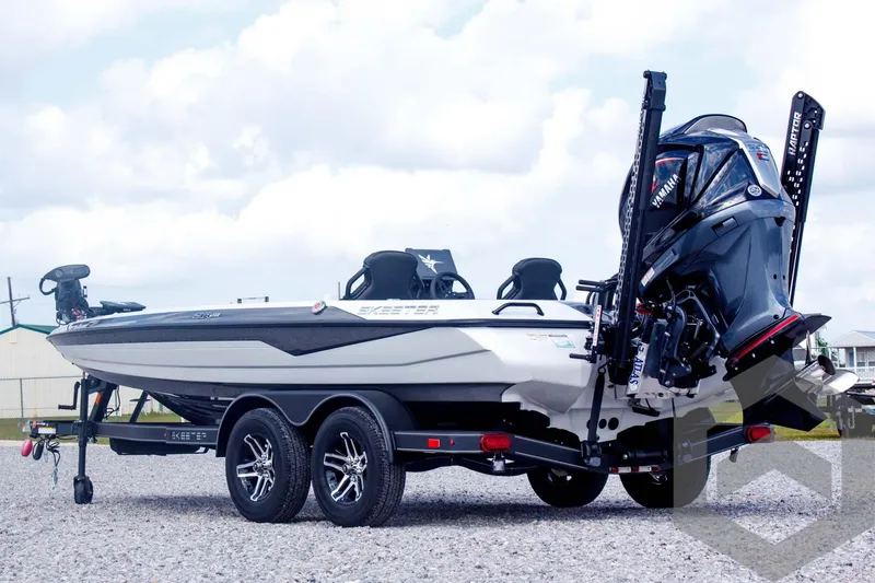 Slide: The Image of 2025 Skeeter ZXR 20 boat on trailer, featuring dual seats and powerful outboard motor. - 7