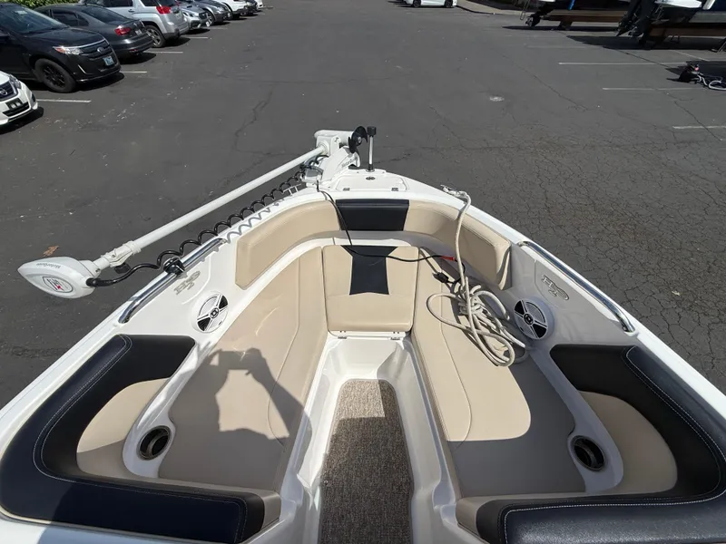 Slide: The Image of 2018 Chaparral 21 Deluxe H20 Ski and Fish boat interior with seating and equipment. - 14