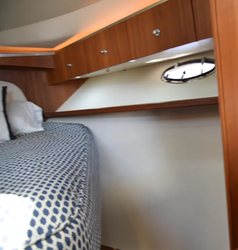 Slide: The Image of Interior cabin of 2006 Tiara Yachts 36 Open with bed and porthole. - 10