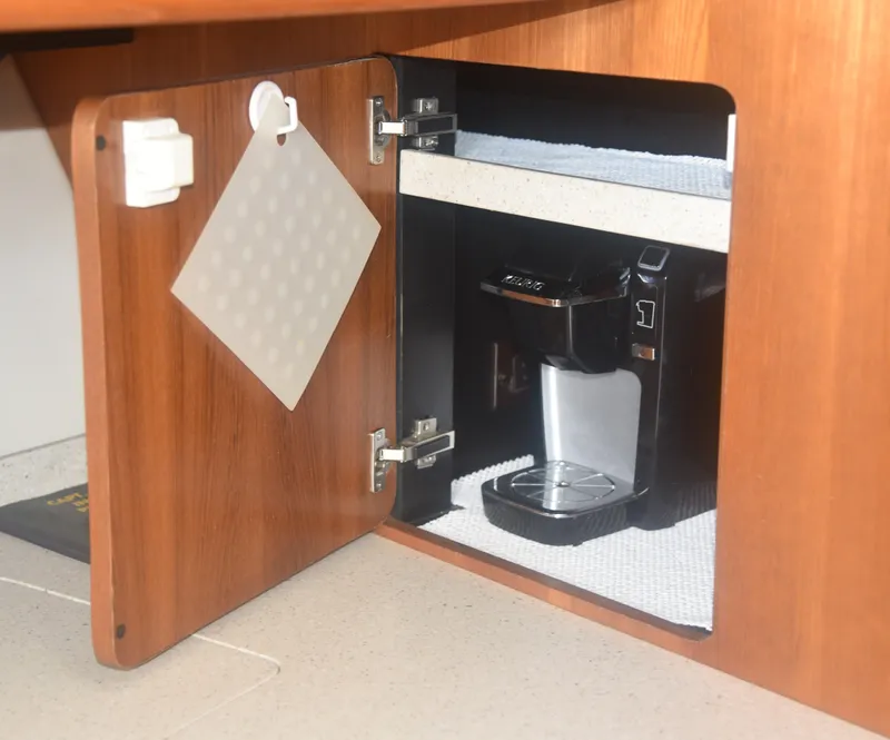 Slide: The Image of Cabinet with coffee maker in 2006 Tiara Yachts 36 Open. - 21