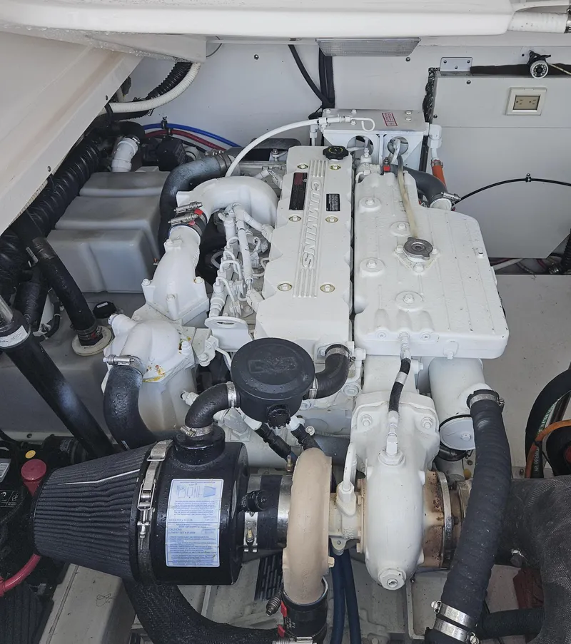 Slide: The Image of Engine compartment of a 2006 Tiara Yachts 36 Open, showcasing detailed mechanical components. - 32