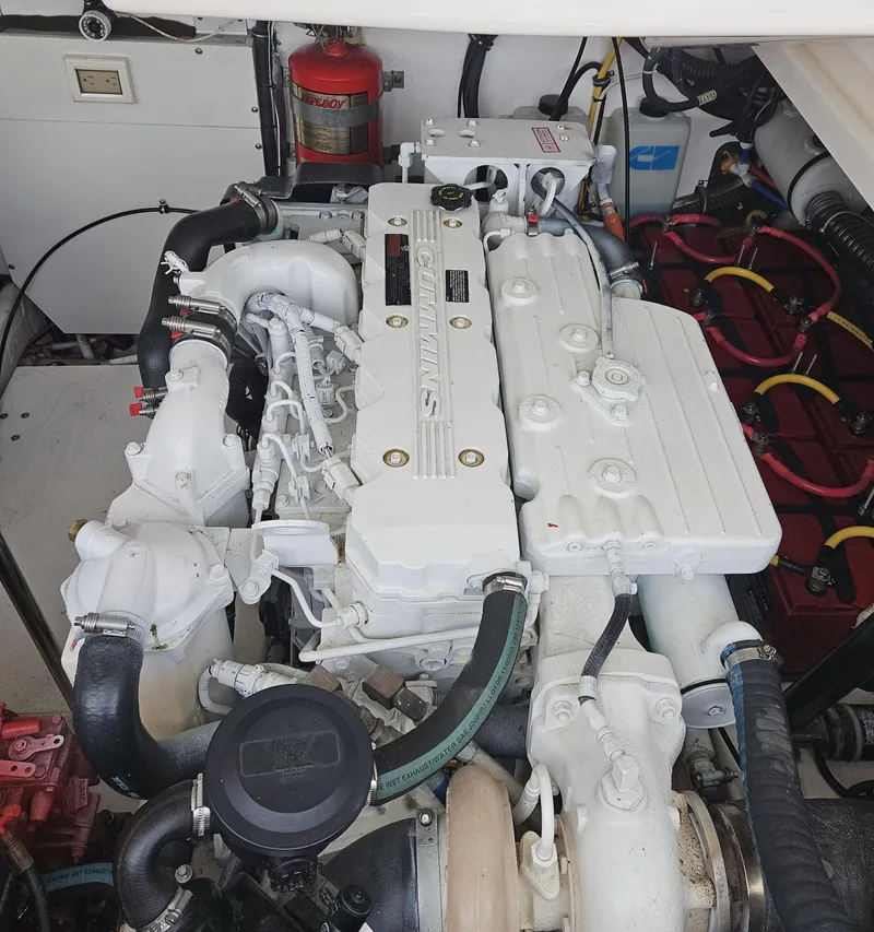 Slide: The Image of Engine compartment of a 2006 Tiara Yachts 36 Open, showcasing detailed mechanical components. - 33