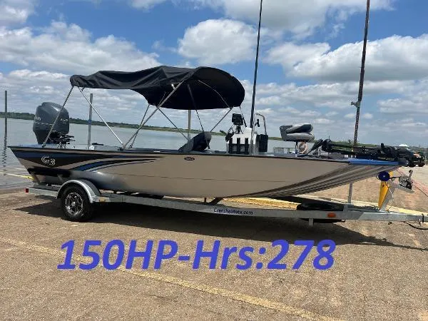 The Image of 2017 G3 20 CCJ DLX boat on trailer, 150HP engine, 278 hours, parked by a lake. - 0