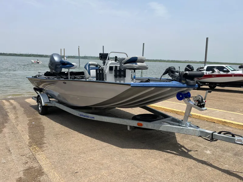 Slide: The Image of 2017 G3 20 CCJ DLX boat on trailer by a lake, ready for launch. - 12