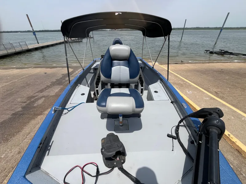 Slide: The Image of 2017 G3 20 CCJ DLX boat with canopy, docked by a lake. - 13
