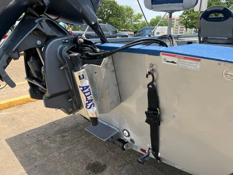 Slide: The Image of 2017 G3 20 CCJ DLX boat with Atlas hydraulic jack plate in parking lot. - 22