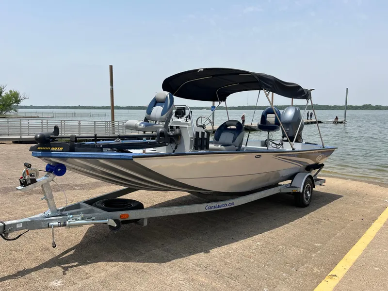 Slide: The Image of 2017 G3 20 CCJ DLX boat on trailer by a lake. - 27