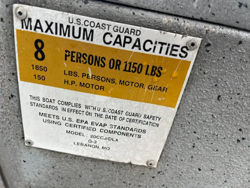 Slide: The Image of U.S. Coast Guard capacity label for 2017 G3 20 CCJ DLX boat, 8 persons or 1150 lbs. - 33