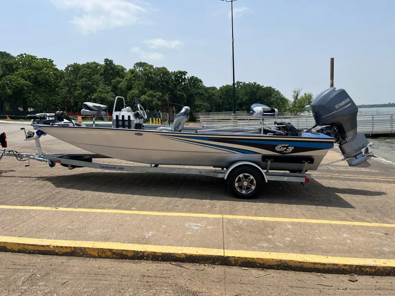 Slide: The Image of 2017 G3 20 CCJ DLX boat on trailer, parked outdoors. - 7