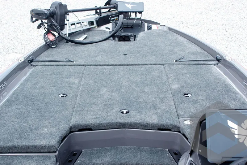 Slide: The Image of 2025 Skeeter ZXR 21 boat deck with advanced fishing equipment and spacious layout. - 21