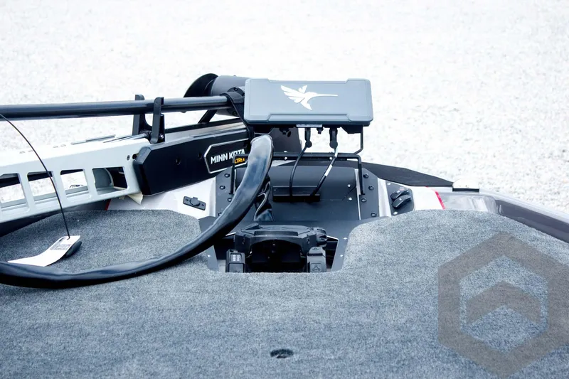 Slide: The Image of 2025 Skeeter ZXR 21 boat deck with Minn Kota trolling motor and control panel. - 26