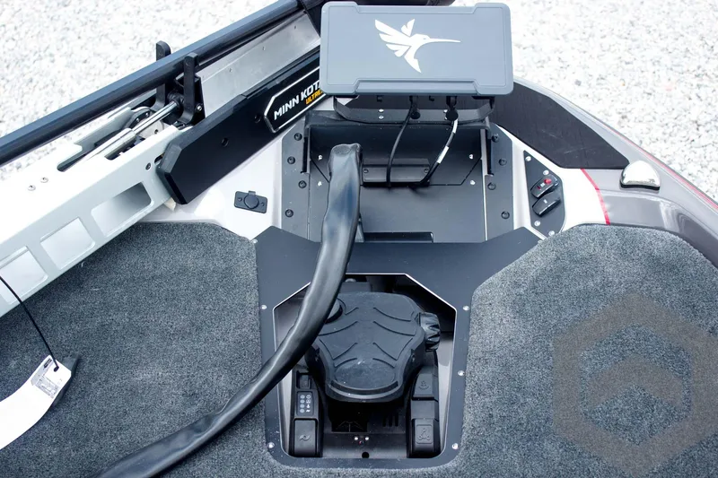 Slide: The Image of 2025 Skeeter ZXR 21 boat cockpit with advanced control panel and navigation system. - 27