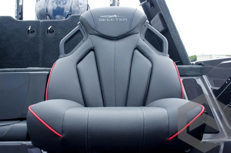 Slide: The Image of 2025 Skeeter ZXR 21 boat seat with ergonomic design and red accents. - 30
