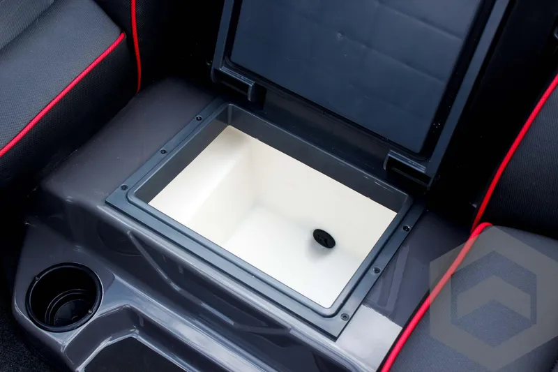 Slide: The Image of Interior storage compartment of 2025 Skeeter ZXR 21 boat with cup holder. - 32