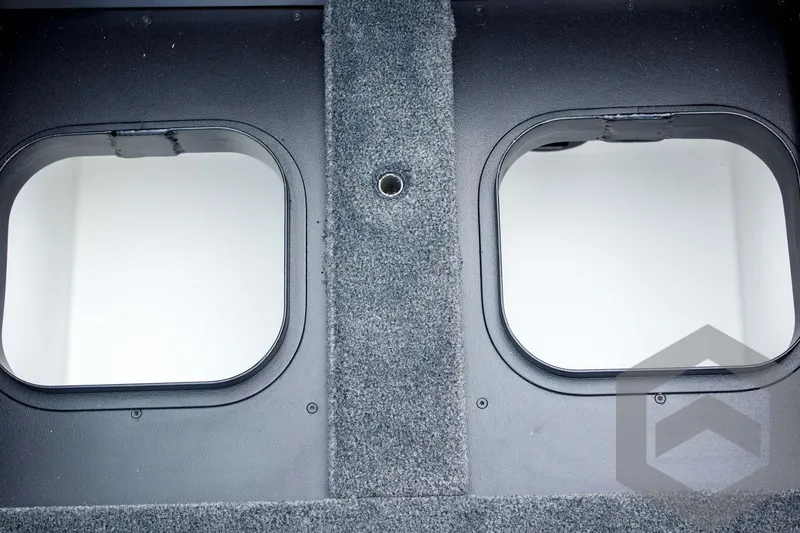 Slide: The Image of Interior view of 2025 Skeeter ZXR 21 boat compartments with carpeted finish. - 41