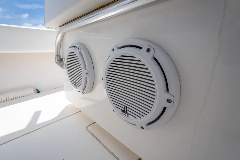 Slide: The Image of Speakers on a 2014 Contender 30st boat, showcasing marine audio system. - 39