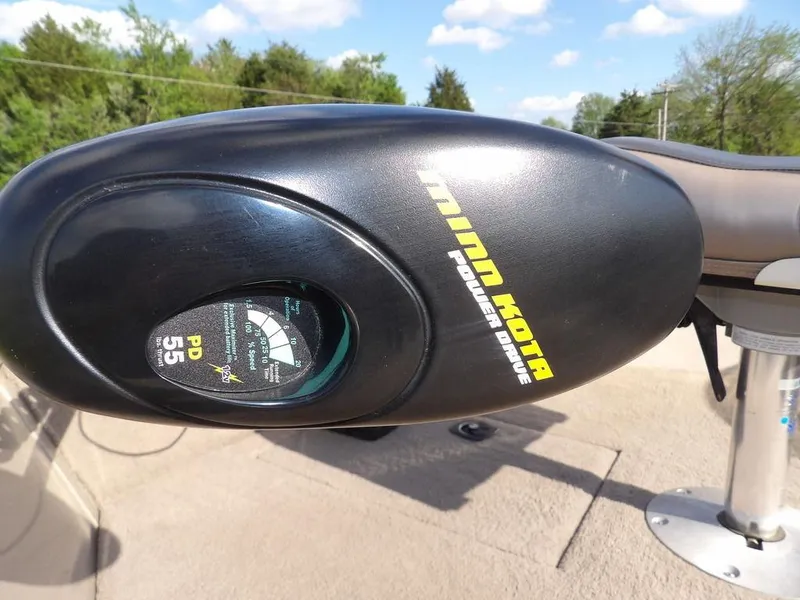 Slide: The Image of Minn Kota Power Drive motor on 2006 Lowe FM165SC boat, outdoor setting. - 11