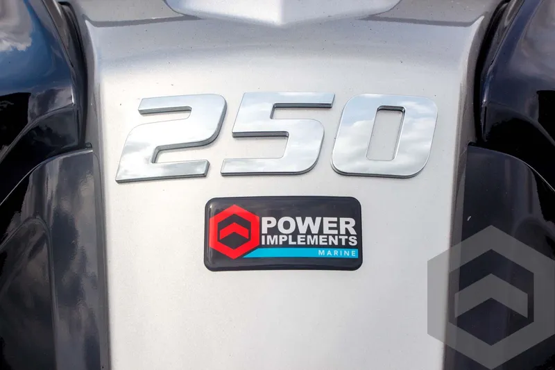 Slide: The Image of 2025 Skeeter FXR 21 Limited engine detail with "250" and "Power Implements Marine" logo. - 13