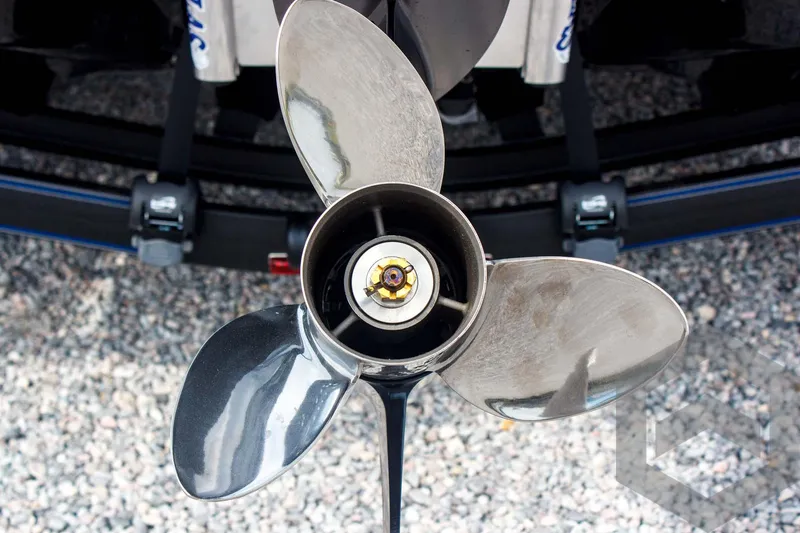 Slide: The Image of Propeller of 2025 Skeeter FXR 21 Limited boat on gravel surface. - 14