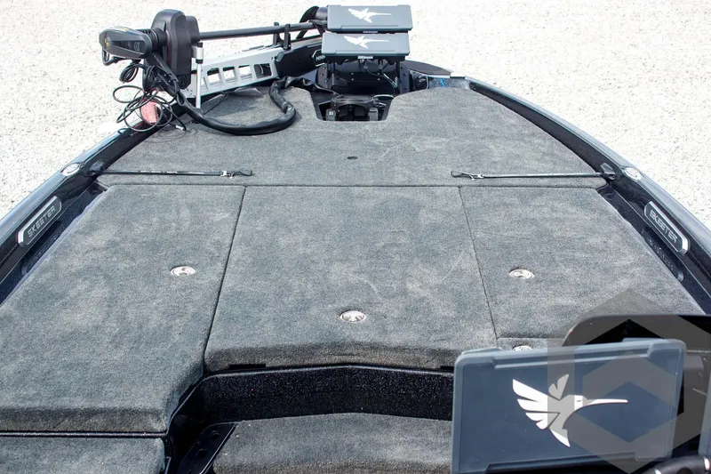 Slide: The Image of 2025 Skeeter FXR 21 Limited boat deck with advanced fishing equipment and storage compartments. - 22
