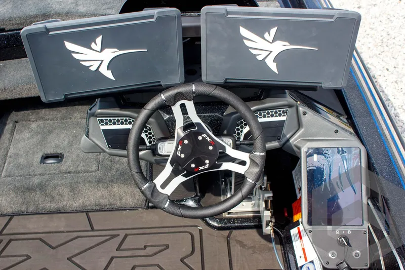 Slide: The Image of 2025 Skeeter FXR 21 Limited dashboard with dual screens and modern steering wheel. - 35