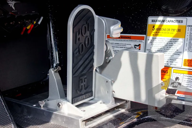 Slide: The Image of Throttle pedal of 2025 Skeeter FXR 21 Limited boat, featuring "Hot Foot" branding. - 38