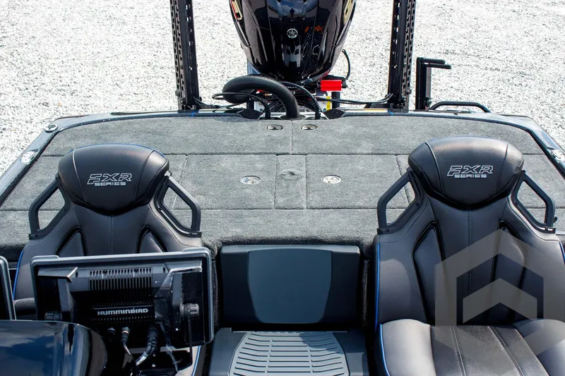 Slide: The Image of 2025 Skeeter FXR 21 Limited boat interior with dual seats and advanced navigation system. - 40