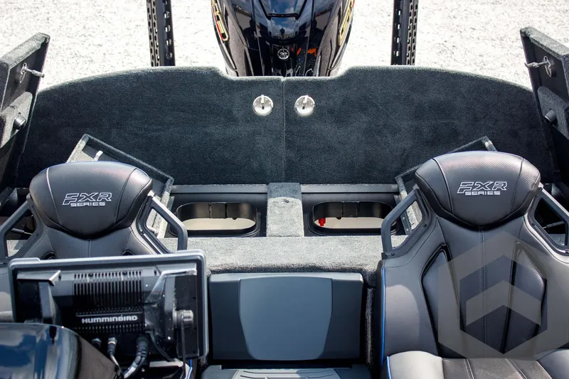 Slide: The Image of 2025 Skeeter FXR 21 Limited boat interior with dual seats and advanced navigation system. - 41