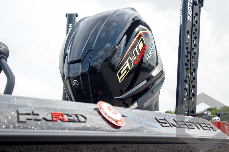 Slide: The Image of 2025 Skeeter FXR 21 Limited boat with powerful SHO engine, sleek design. - 9