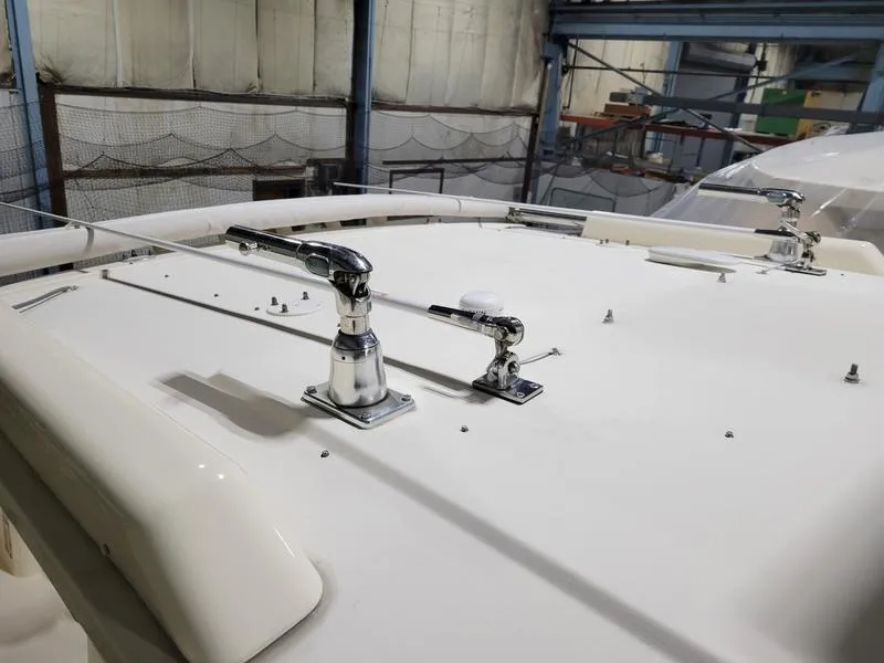 Slide: The Image of 2019 Grady-White 336 Canyon boat deck with mounted hardware in a storage facility. - 3