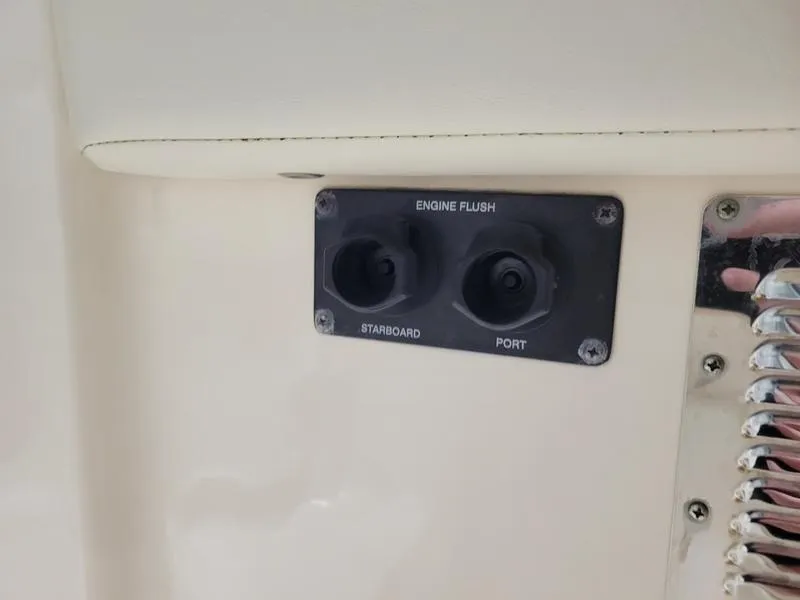 Slide: The Image of Engine flush panel on 2019 Grady-White 336 Canyon boat, featuring starboard and port controls. - 43
