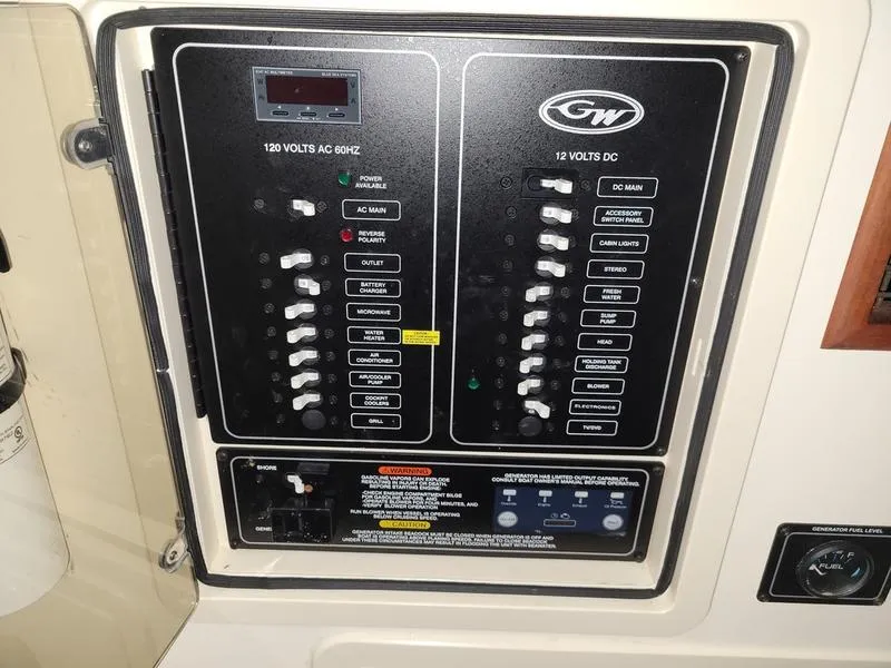 Slide: The Image of Electrical control panel on a 2019 Grady-White 336 Canyon boat. - 6