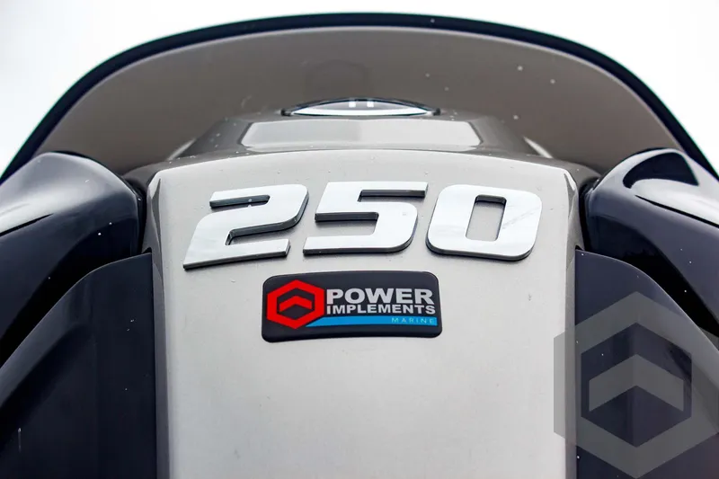Slide: The Image of Outboard motor with "250" and "Power Implements" logo on a 2025 Tidewater 2410 Bay Max. - 13